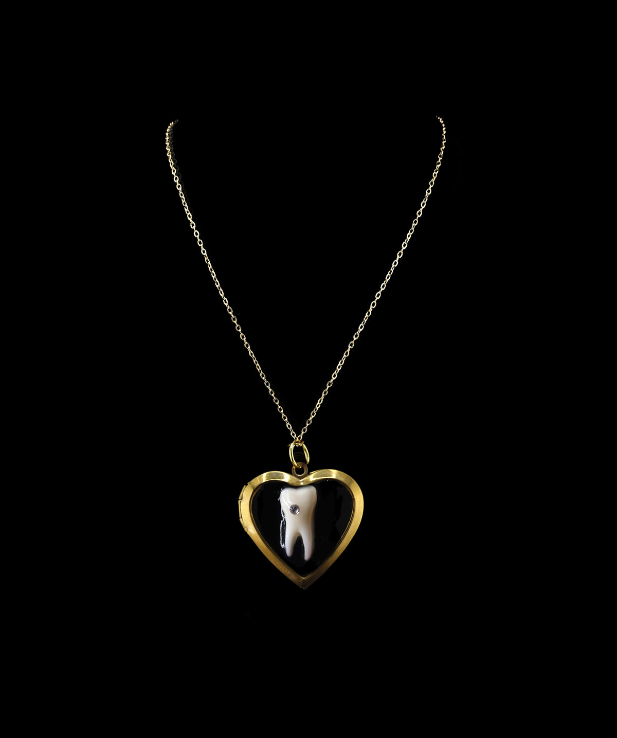 Loose Tooth Locket