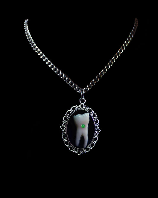 Loose Tooth Uranium Pendant