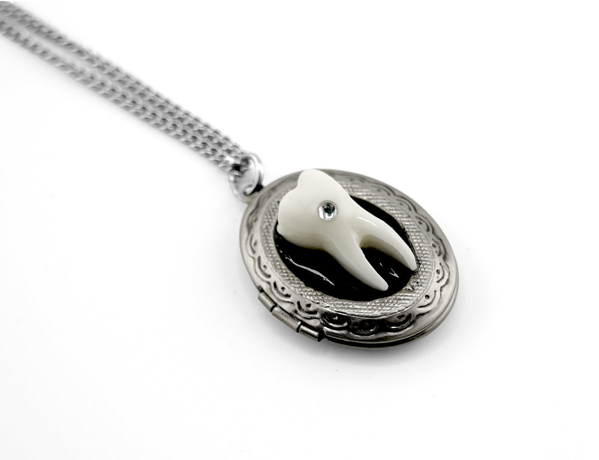 Loose Tooth Locket