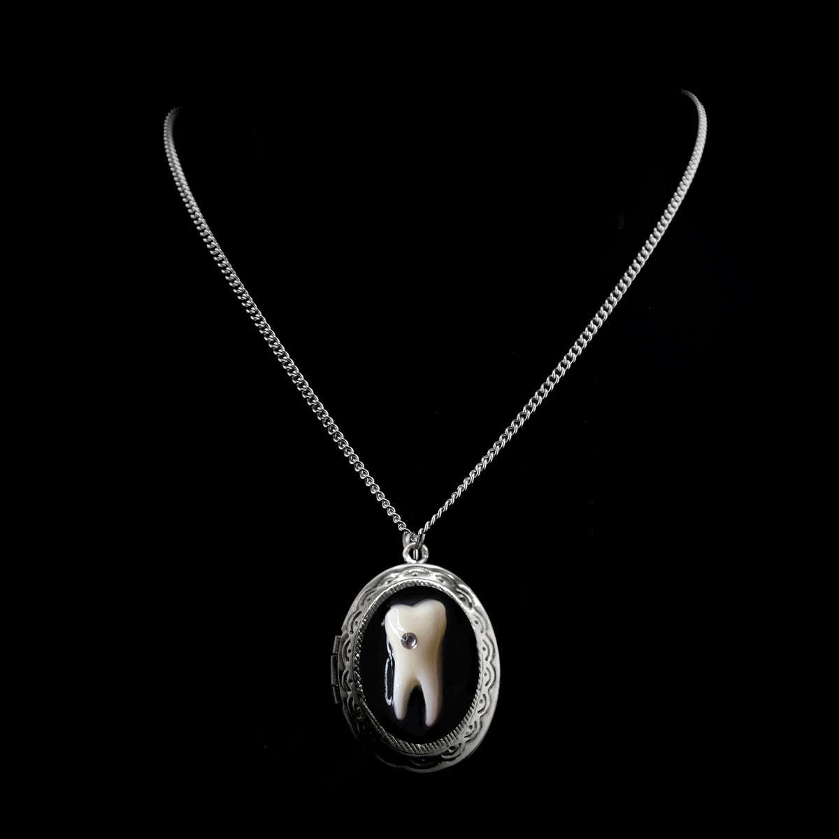 Loose Tooth Locket