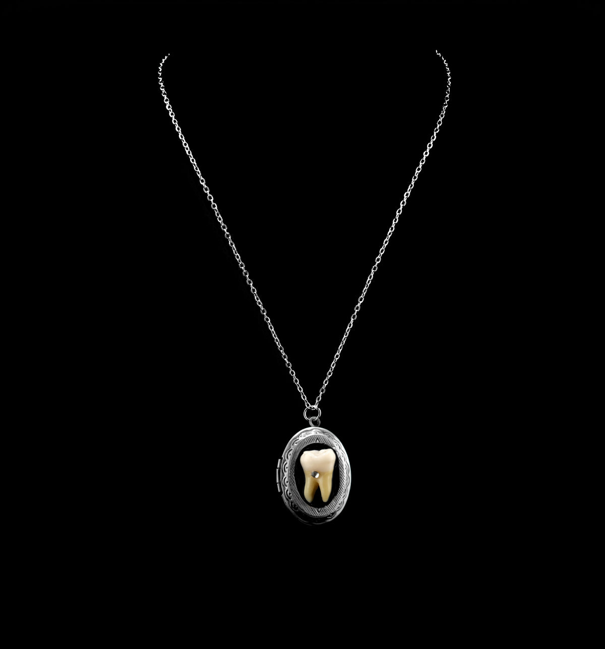 Loose Tooth Locket