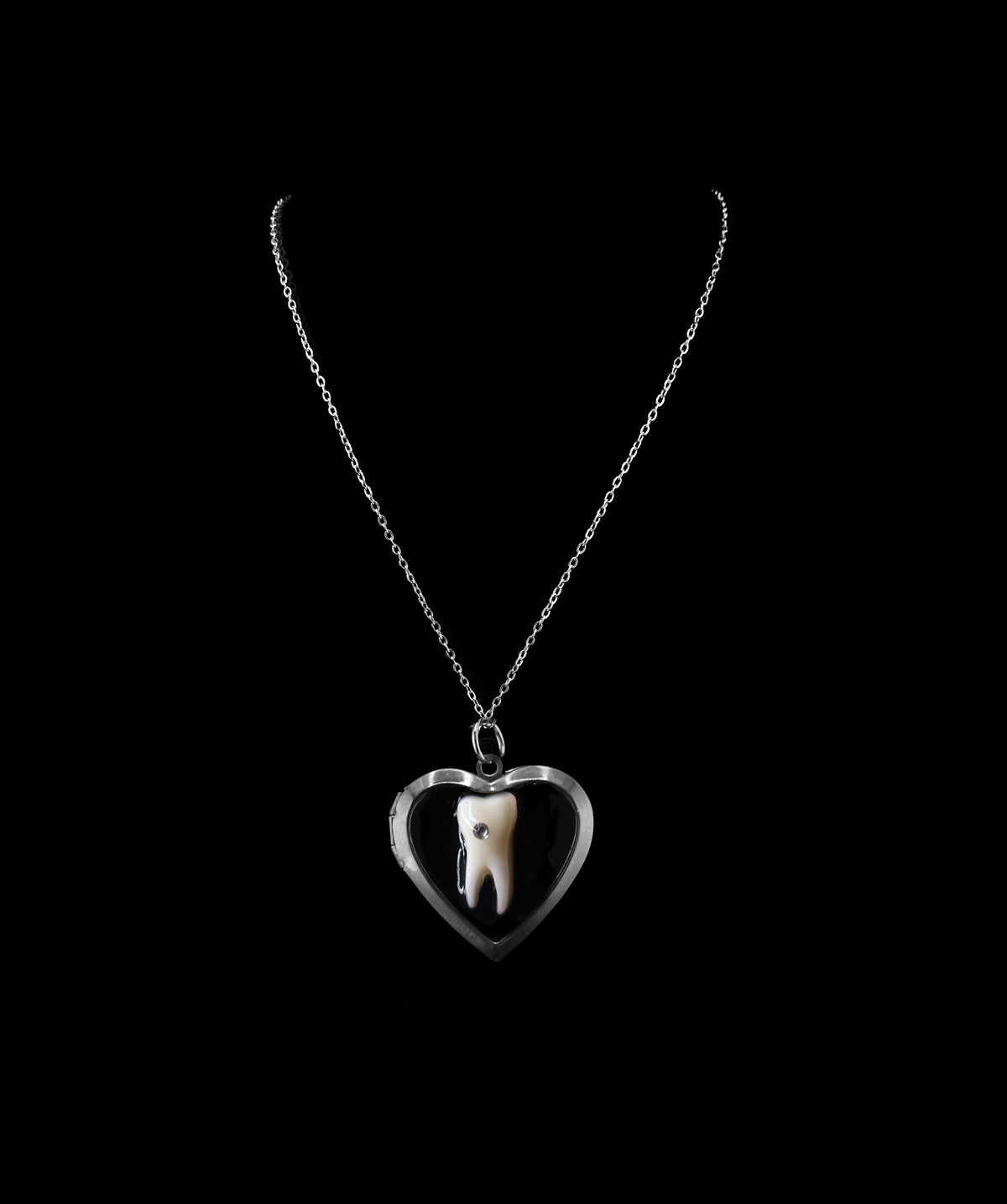 Loose Tooth Locket