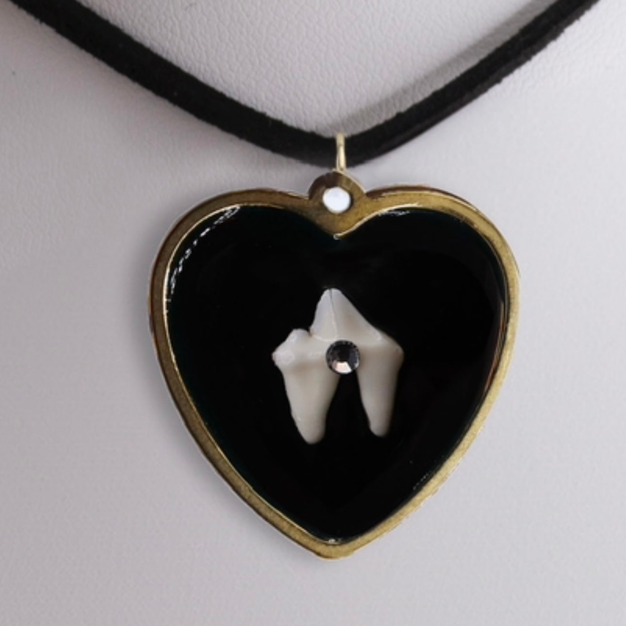Loose Tooth Uranium Pendant