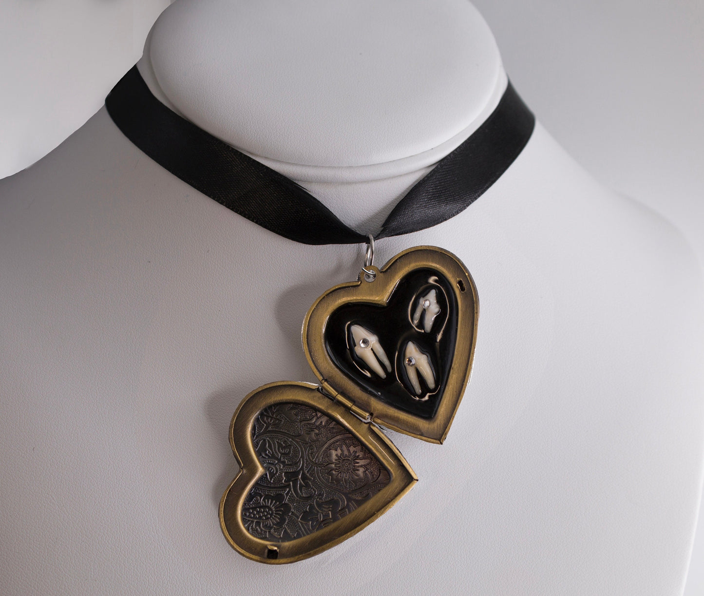 Loose Tooth Locket