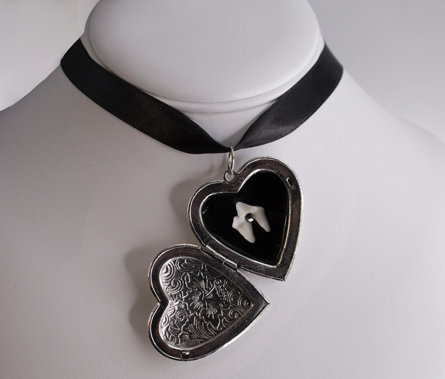 Loose Tooth Locket